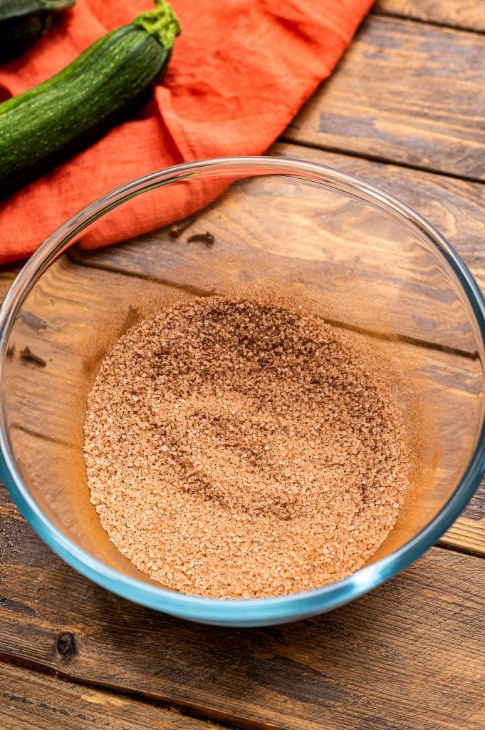 Glass bowl with cinnamon sugar in it.