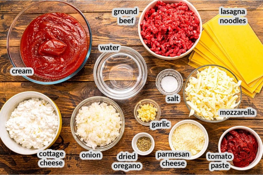 Overhead image showing ingredients for Crock Pot Lasagna in bowls