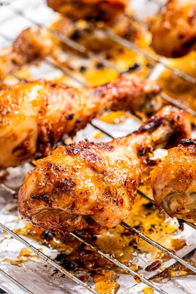 Honey Garlic Chicken Drumsticks on baking rack that's sitting on baking sheet