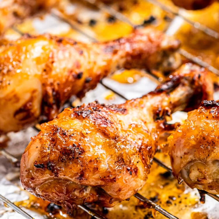 Honey Garlic Chicken Drumsticks on baking rack that's sitting on baking sheet