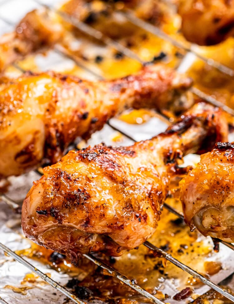 Honey Garlic Chicken Drumsticks on baking rack that's sitting on baking sheet