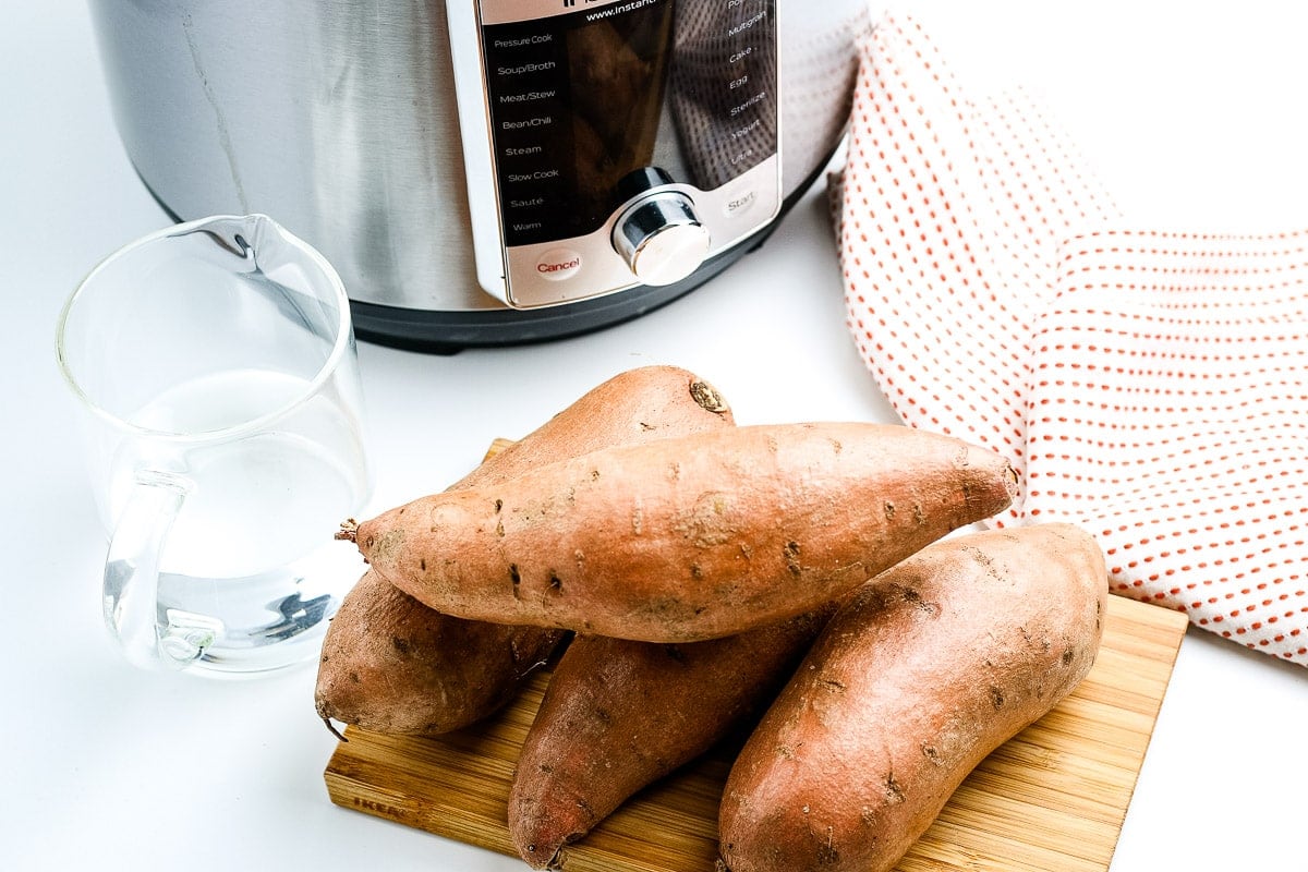 Sweet Potatoes in front of Instant Pot