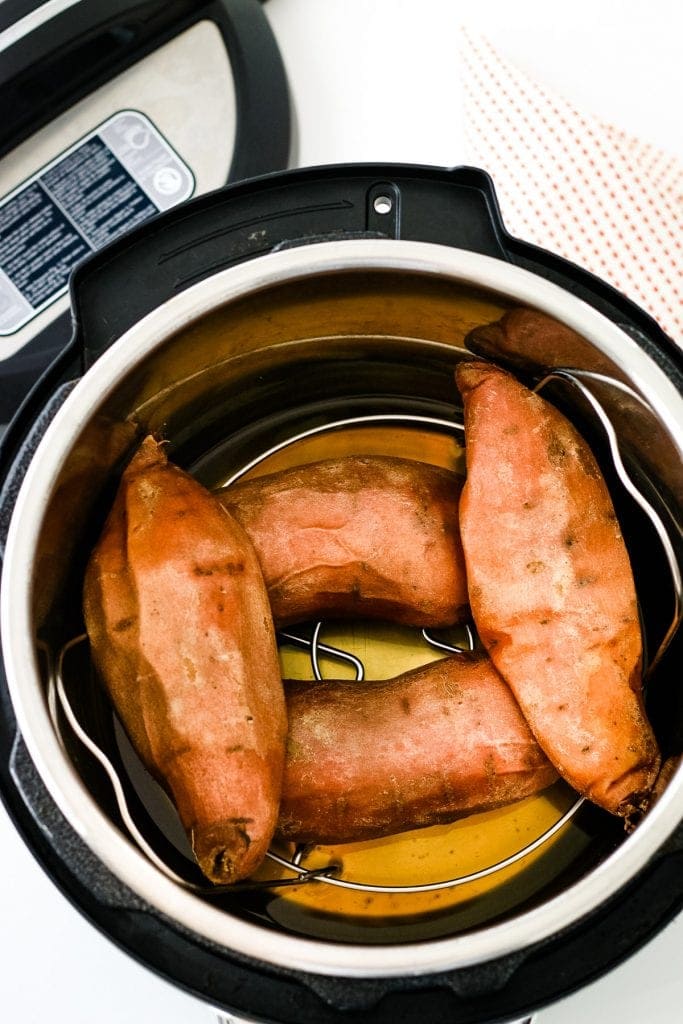 Four sweet potatoes in Instant Pot after cooking