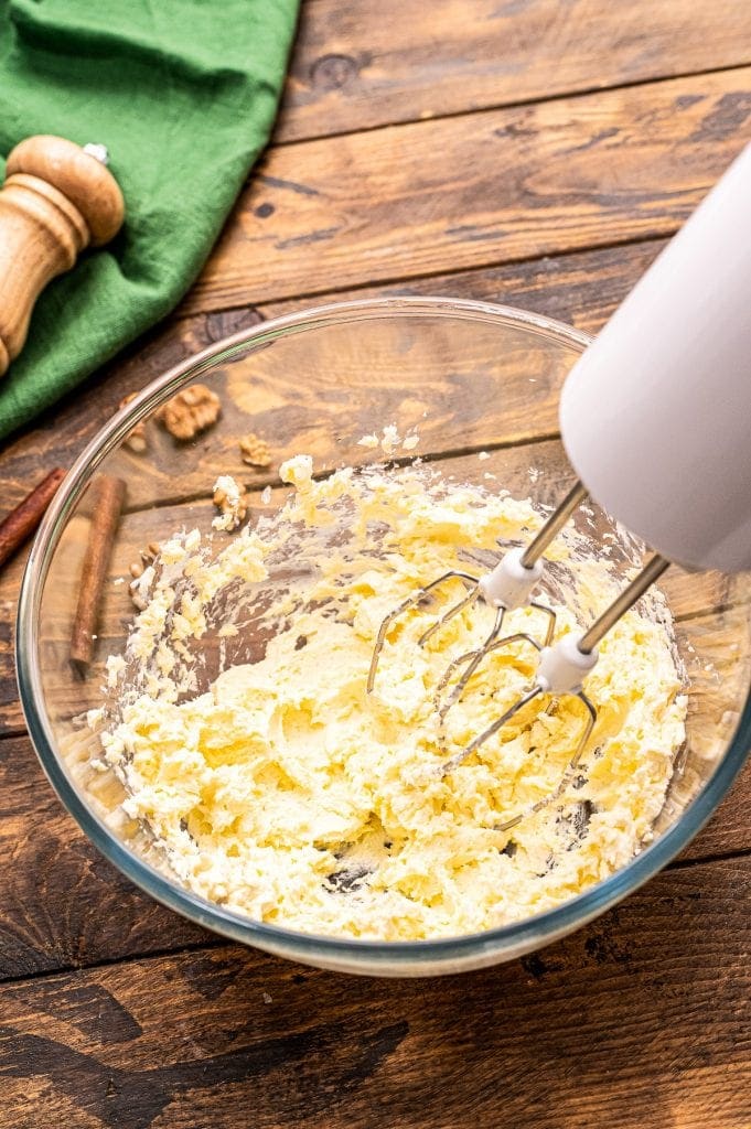 Hand mixer mixing creaming Cream Cheese Frosting
