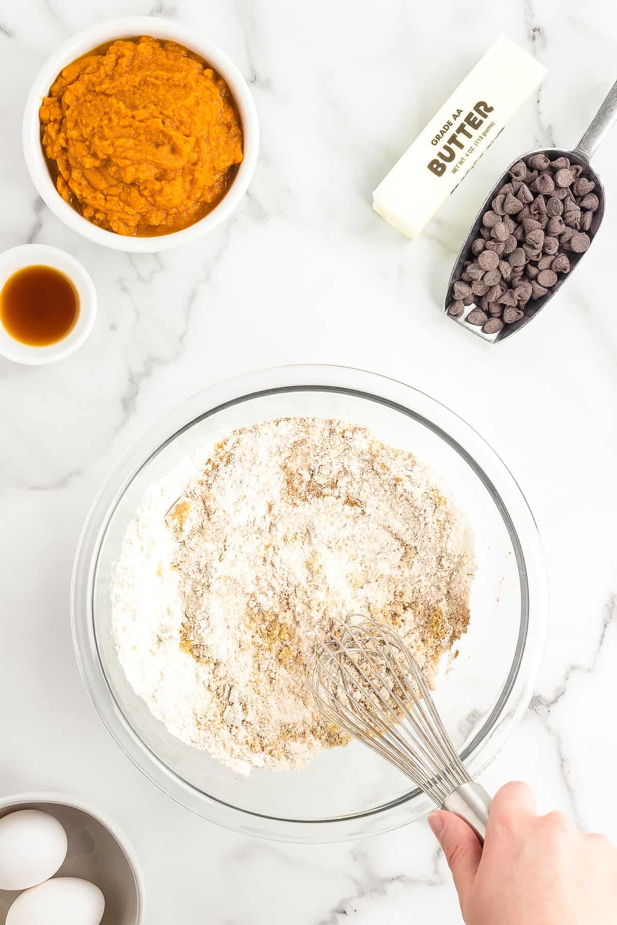 Stirring dry ingredients for Pumpkin Chocolate Chip Muffins