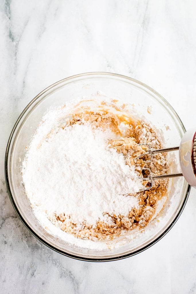 Powdered sugar added to creamed frosting