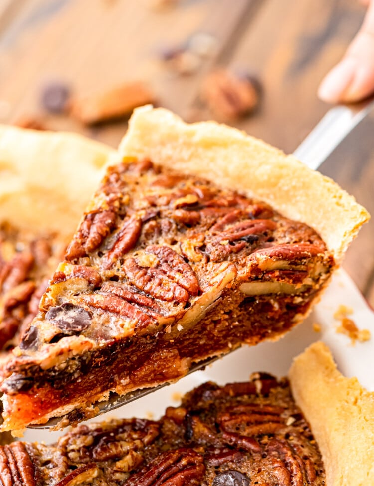 Slice of Chocolate Pecan Pie on pie server