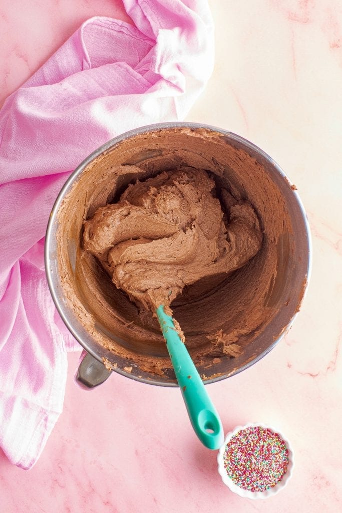 Overhead image of fluffy chocolate buttercream frosting in it