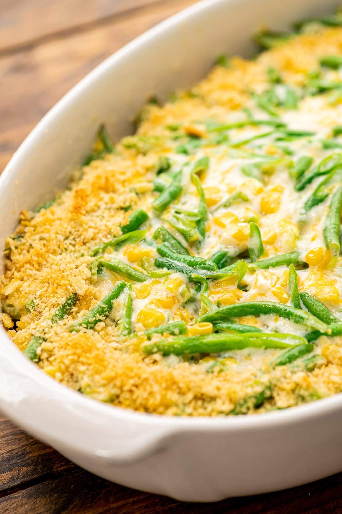 Green Bean Corn Casserole in a white casserole dish