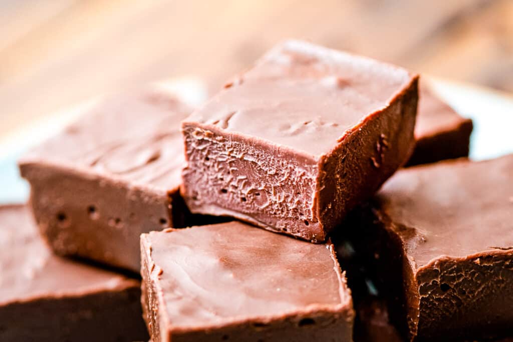 Close up image of pieces of chocolate fudge stacked
