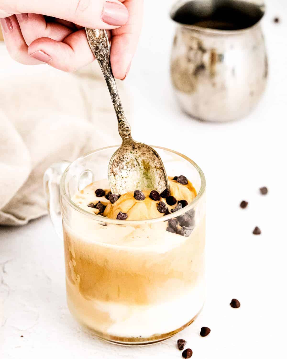 Spoon taking a spoonful of Affogato out of glass