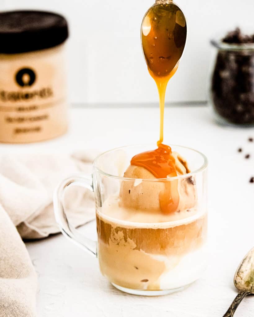 Spoon drizzling caramel over top of Affogato