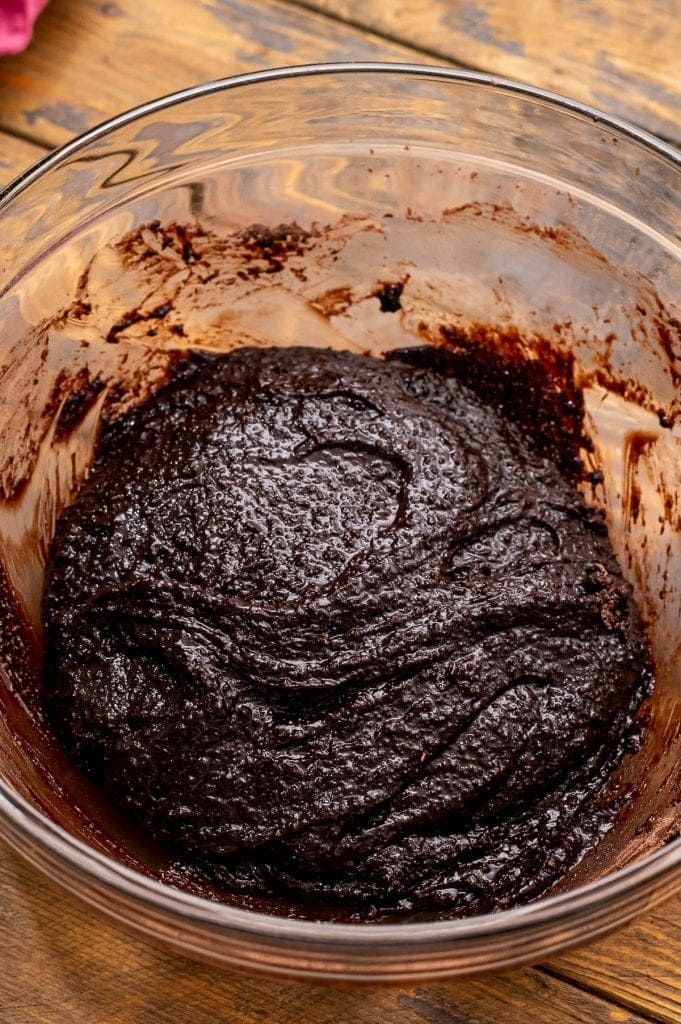 Glass bowl with chocolate cookies mixed up