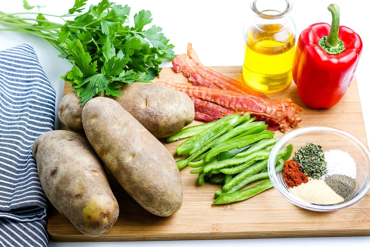 Breakfast Potatoes Ingredients on wooden cutting board