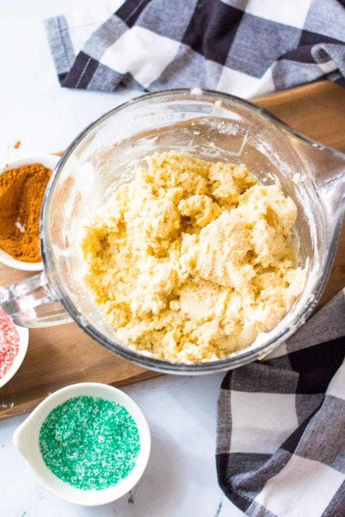 Snickerdoodle batter mixed in glass mixing bowl.