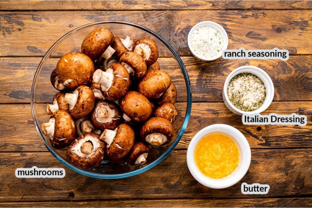 Crock Pot Ranch Mushrooms Ingredients in bowls on wooden background