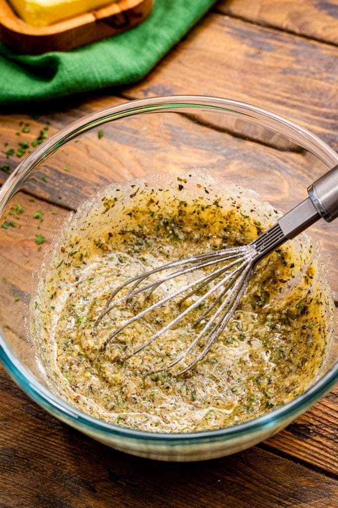 Glass bowl with butter mixture in it.