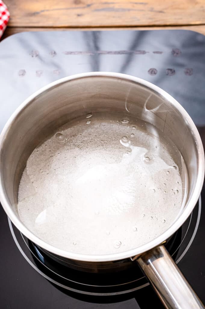 Saucepan with sugar and corn syrup mixture in it