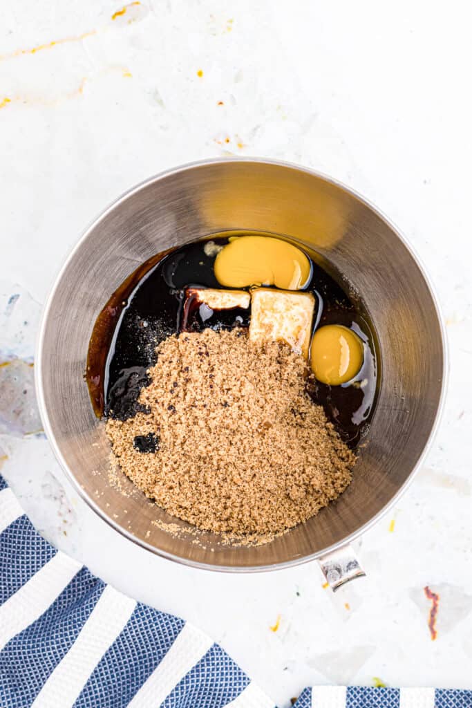 Overhead of image of wet ingredients for molasses cookies before mixing