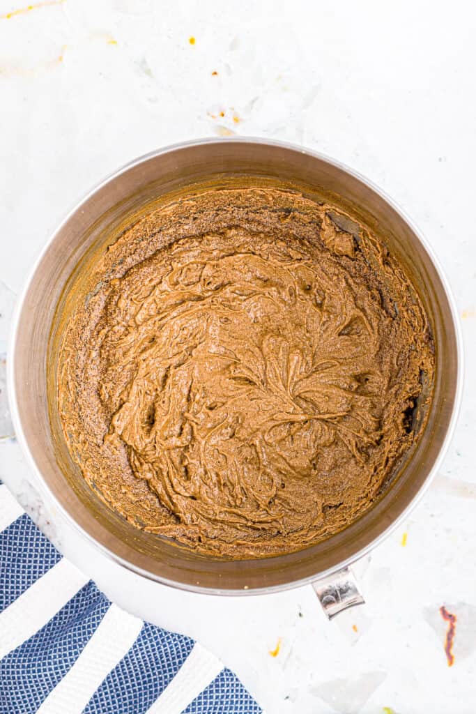 Overhead of image of wet ingredients for molasses cookies after mixing