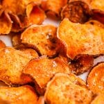 Close up of cooked Air Fryer Sweet Potato Chips seasoned with salt