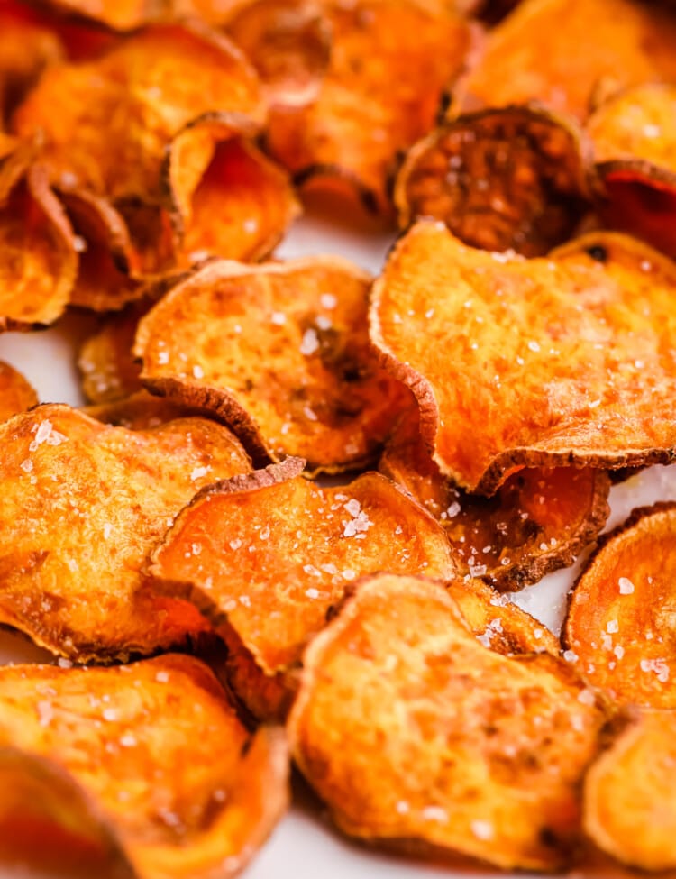 Close up of cooked Air Fryer Sweet Potato Chips seasoned with salt