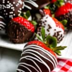 Chocolate Covered Strawberry on red and white checkered napkin