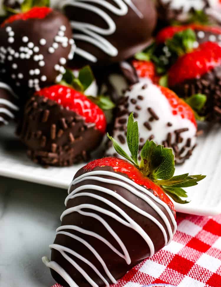 Chocolate Covered Strawberry on red and white checkered napkin
