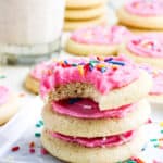 Stack of three Lofthouse Sugar cookies with pink frosting