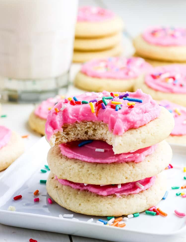 Stack of three Lofthouse Sugar cookies with pink frosting