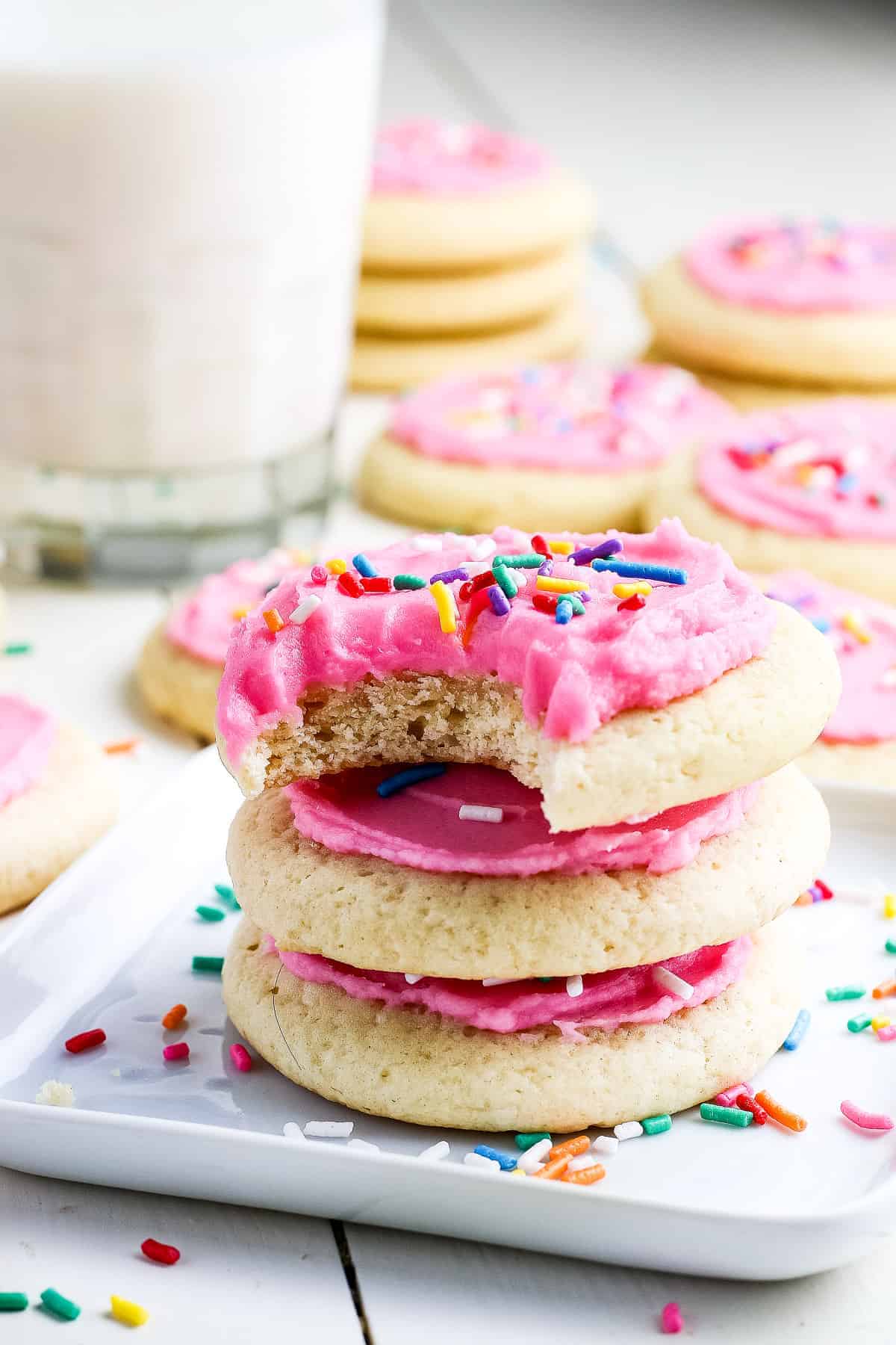 Stack of three Lofthouse Sugar cookies with pink frosting