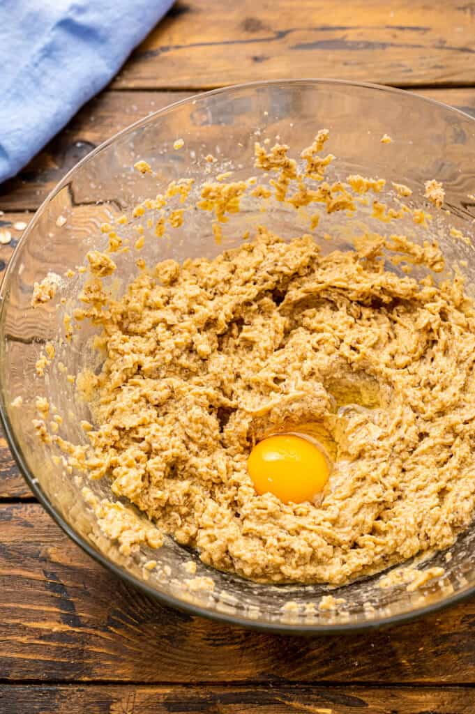 Oatmeal cookie dough with egg in middle not mixed in