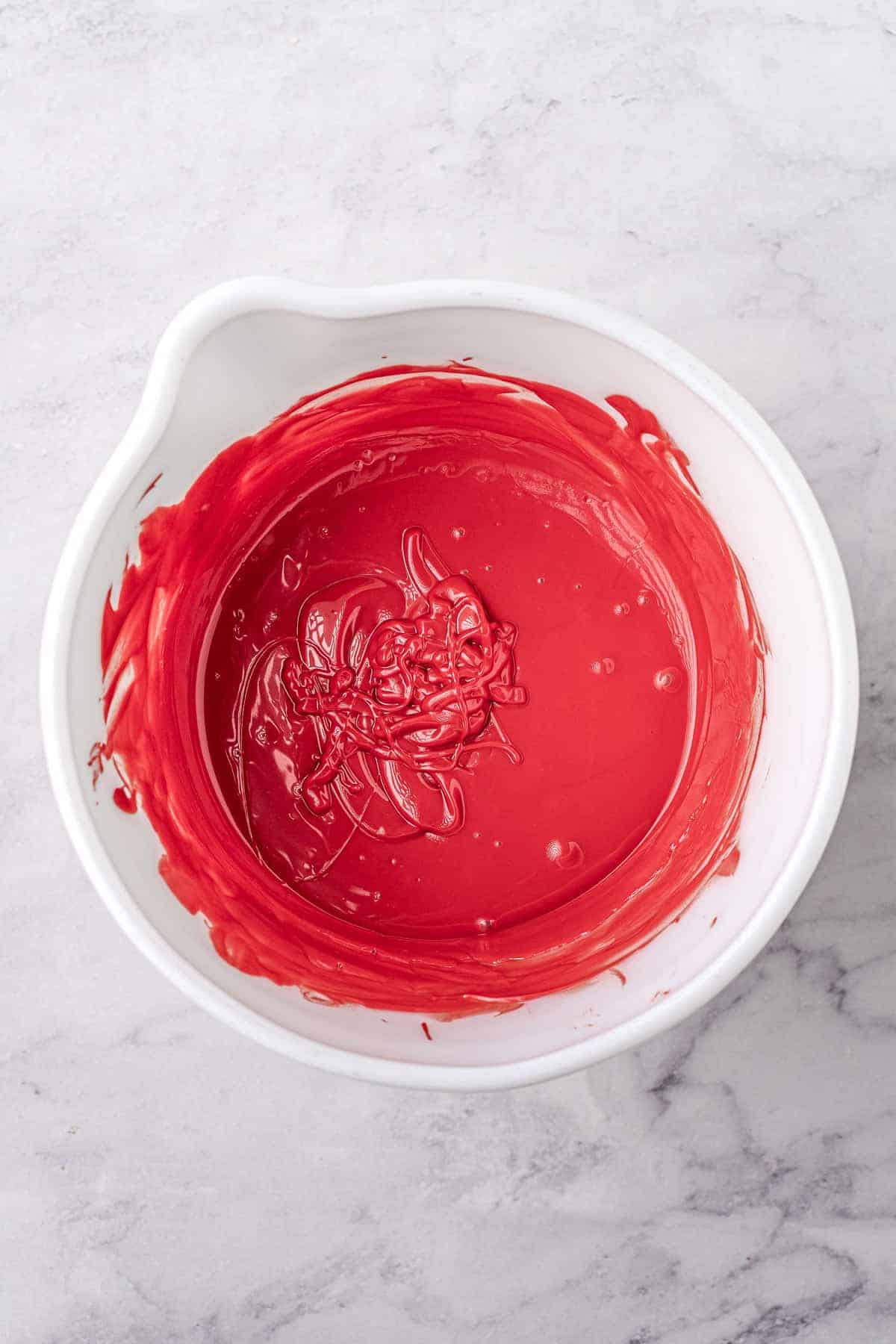 Melted Red Candy Melts in bowl