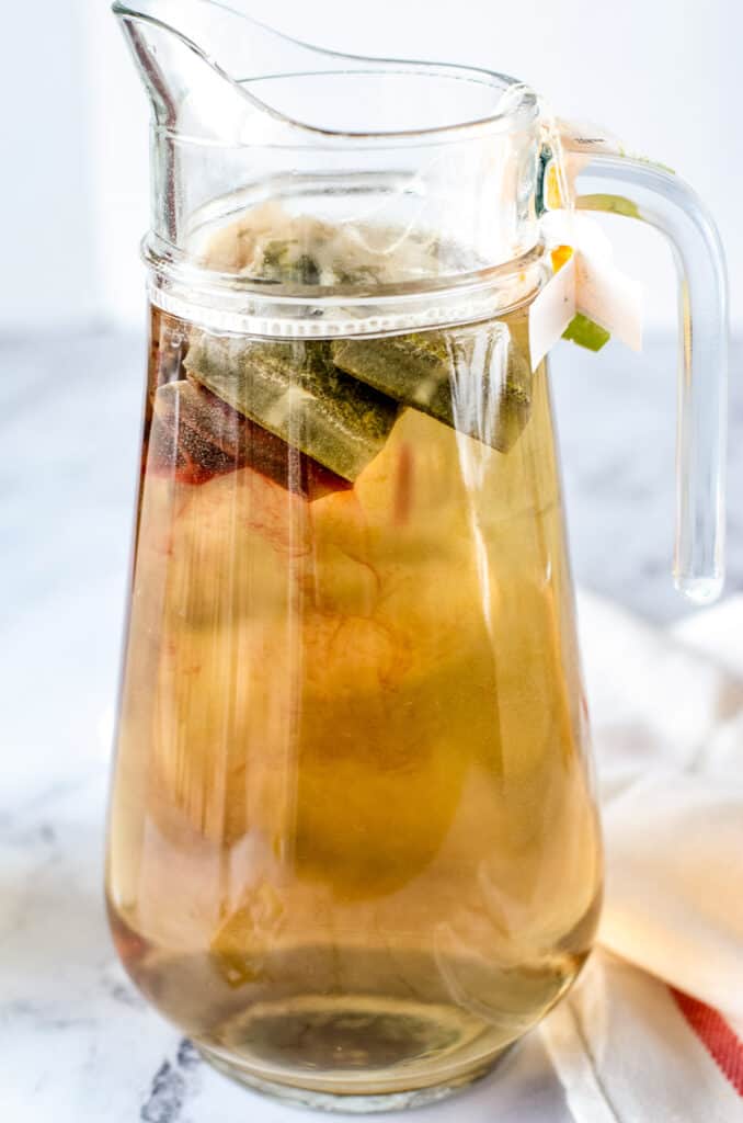 Large pitcher with tea bags that have been steeping