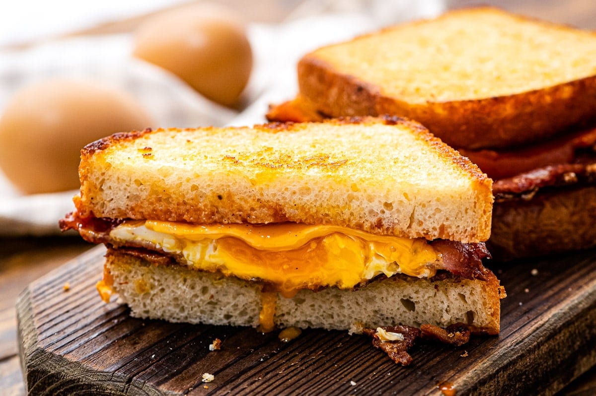 Fried Egg Sandwich that's cut in half showing the inside of the sandwich.