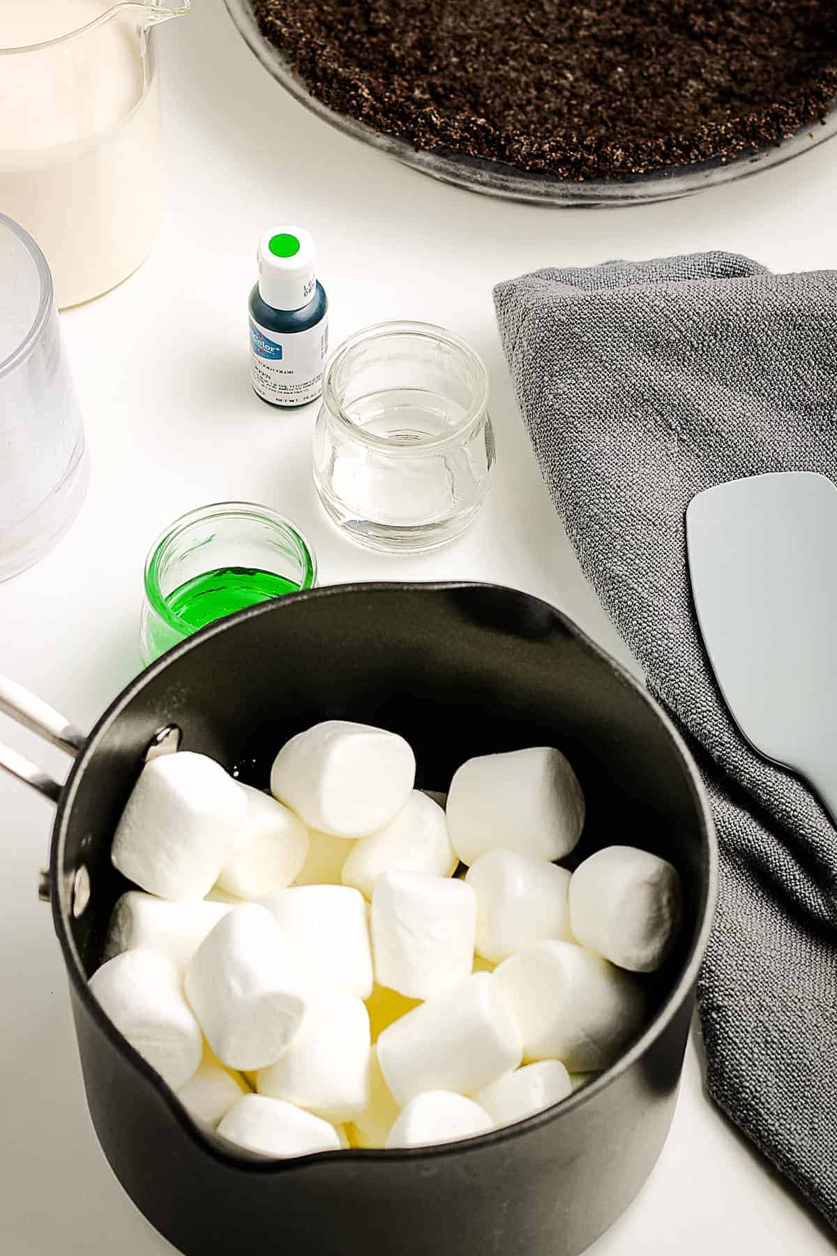 A saucepan with marshmallows in it