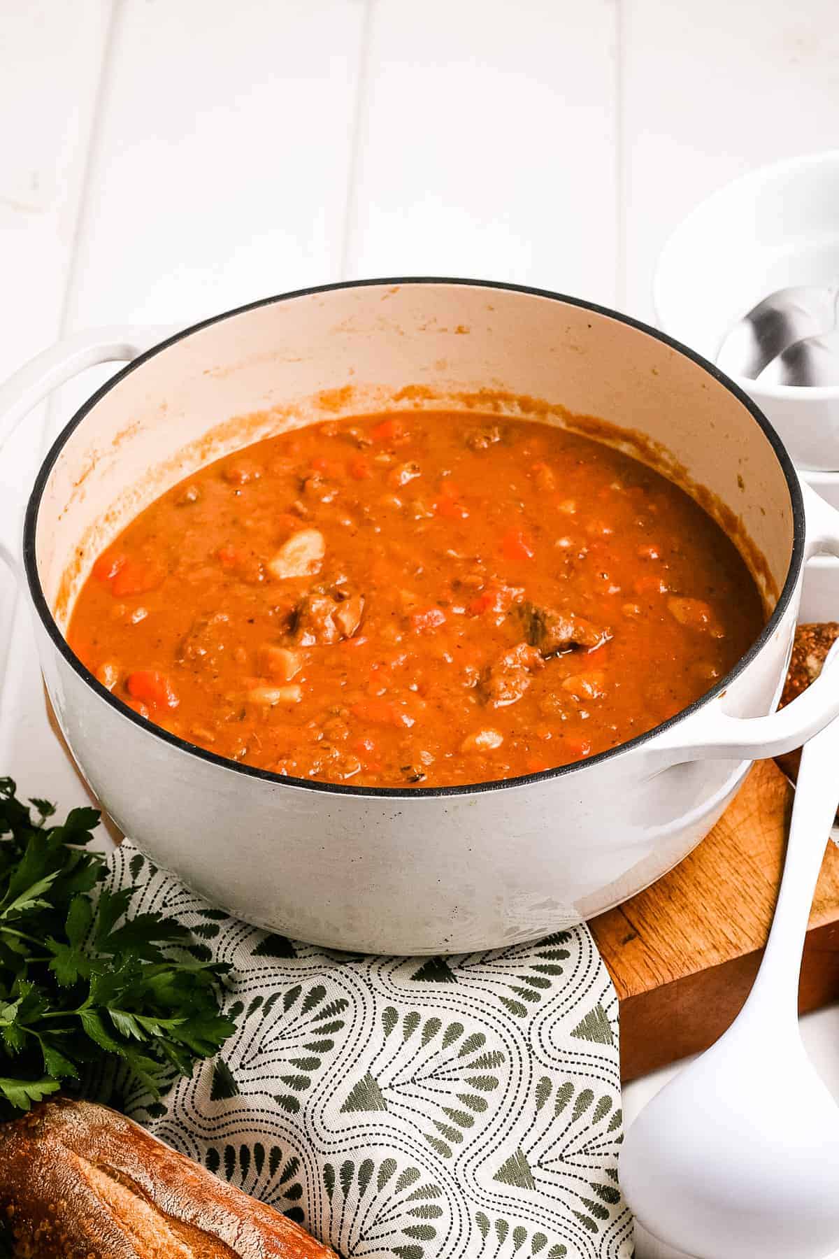 White dutch oven full of Irish Beef Stew