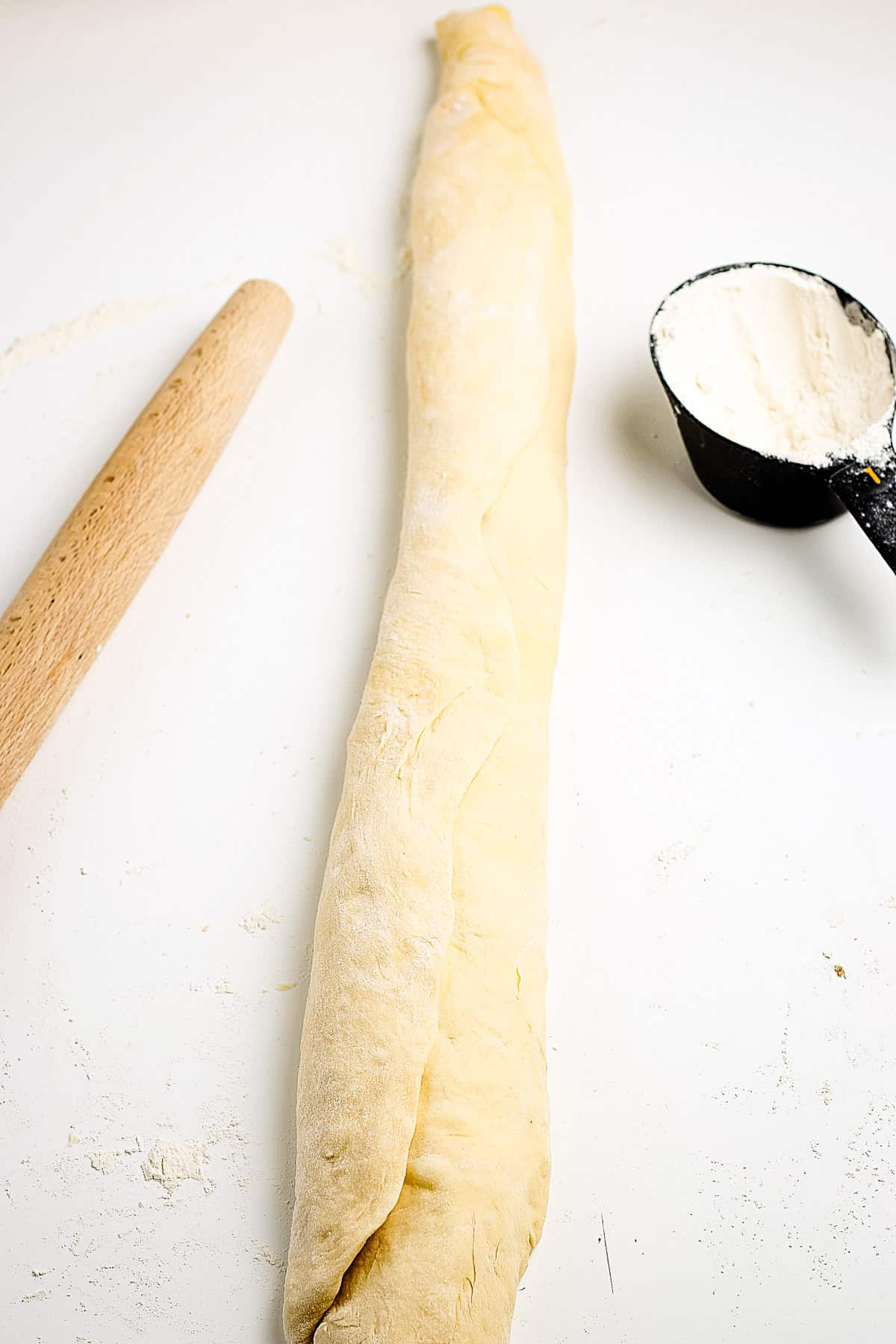 Dough rolled up into a log shape.