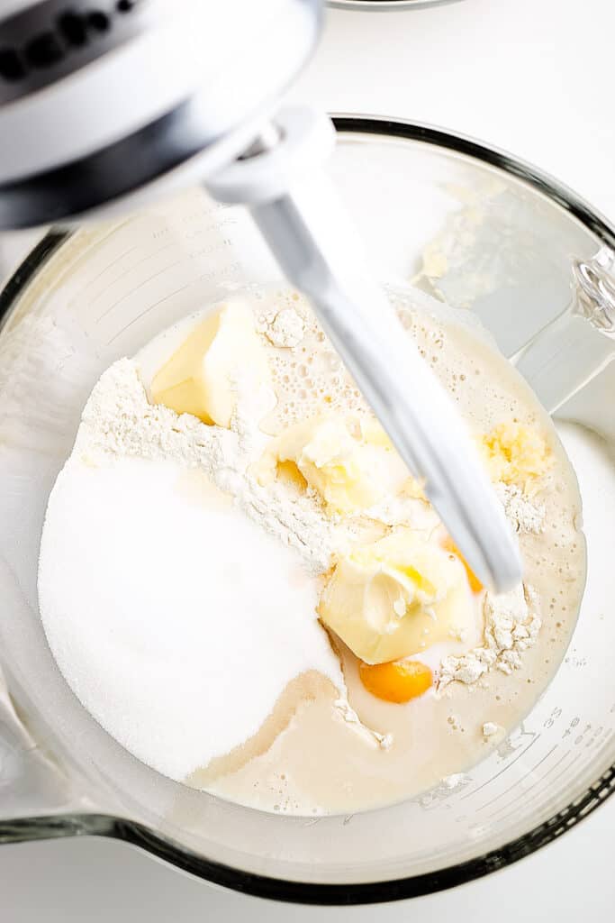 Ingredients to make dough for Kind Cake in glass bowl