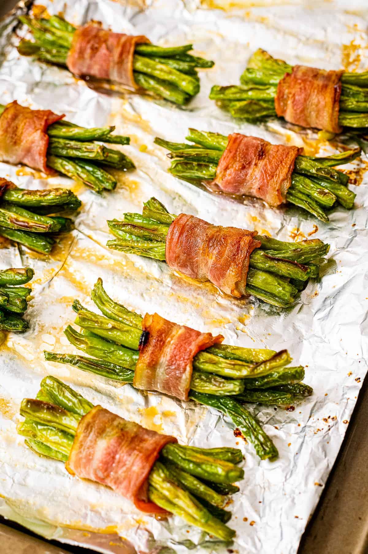 Bacon Wrapped Green Beans Recipe on a sheet pan with foil