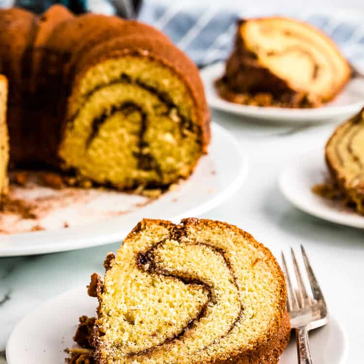 Bundt Coffee Cake Slice on plate with cake in background