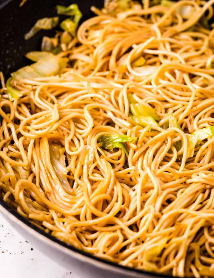 Skillet with chow mein in it