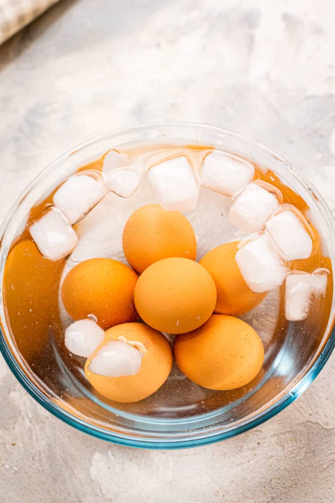 Ice water bath in glass bowl for hard boiled eggs