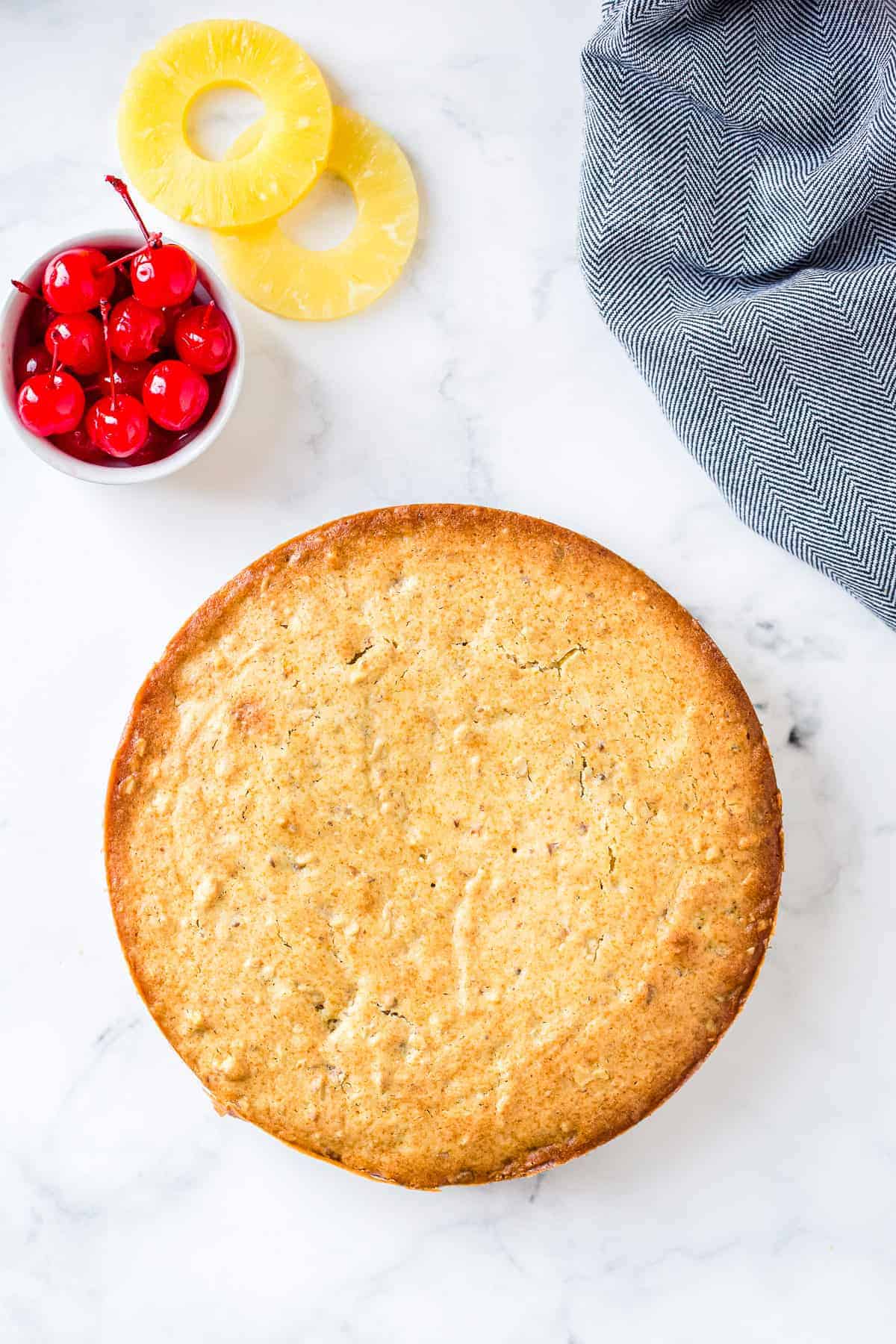 Baked pineapple upside down cake before flipping upside down