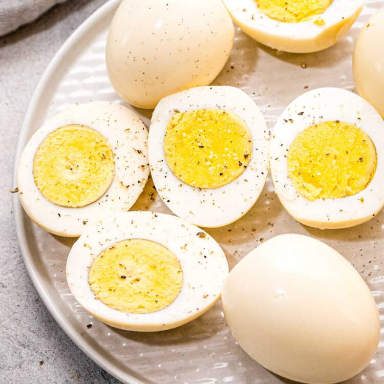 Pressure Cooker Hard Boiled Eggs on plate Square cropped image