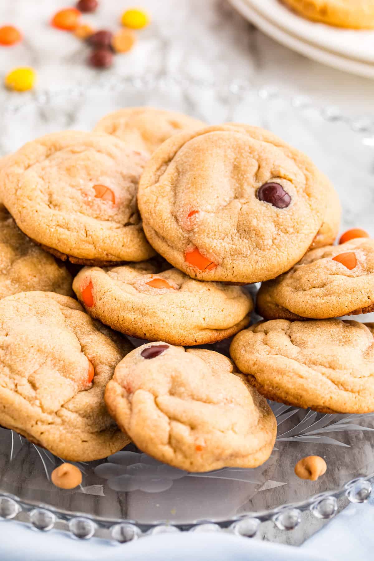 Reese's Pieces Peanut Butter Cookies on a glass platter