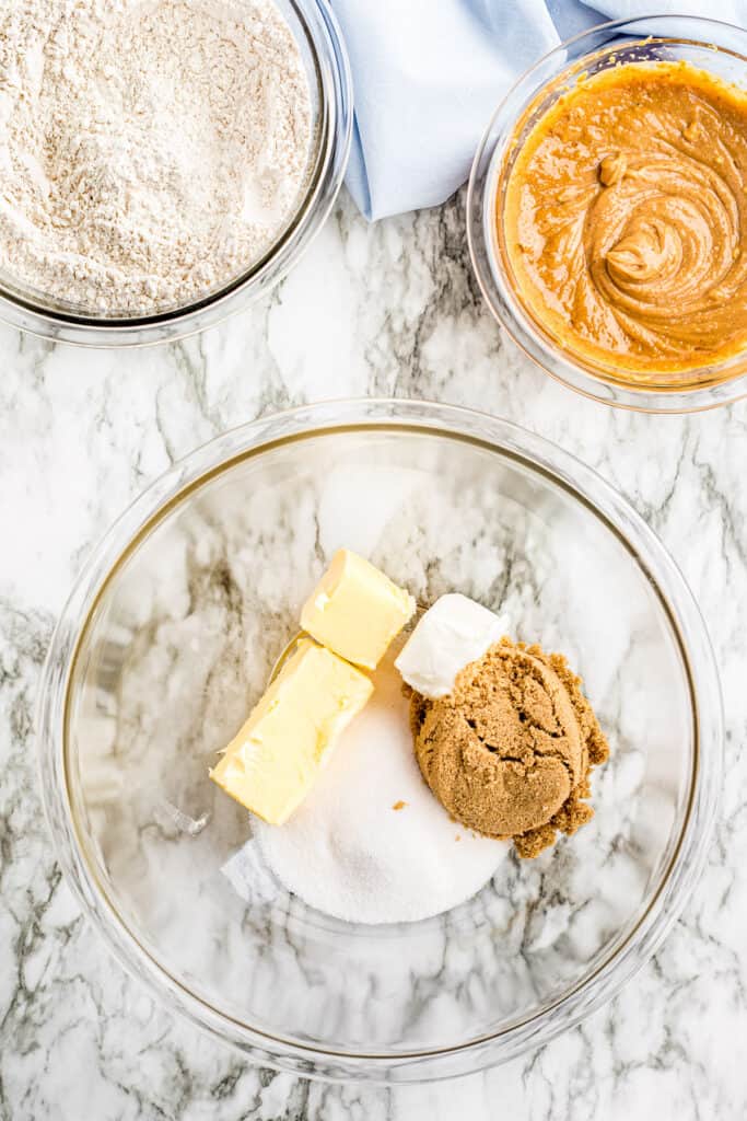 Overhead Image of glass mixing bowl with ingredients to cream together for cookies