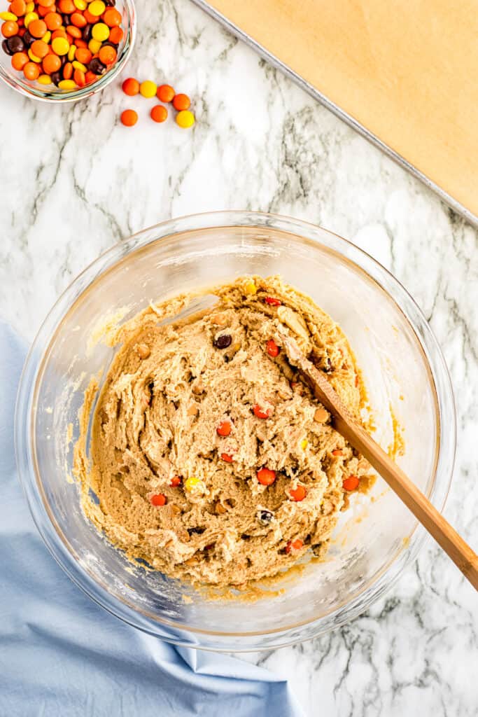 Peanut Butter Cookie dough with Reese's pieces in glass bowl