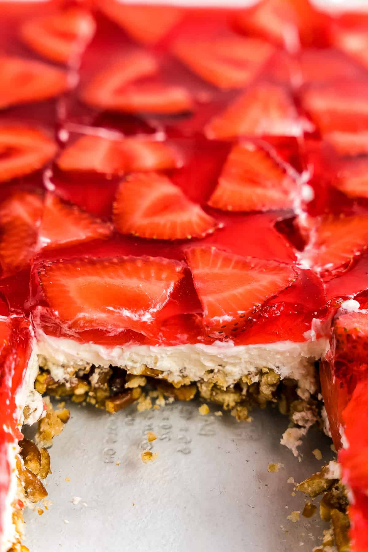 Slice of Strawberry Pretzel Salad in pan