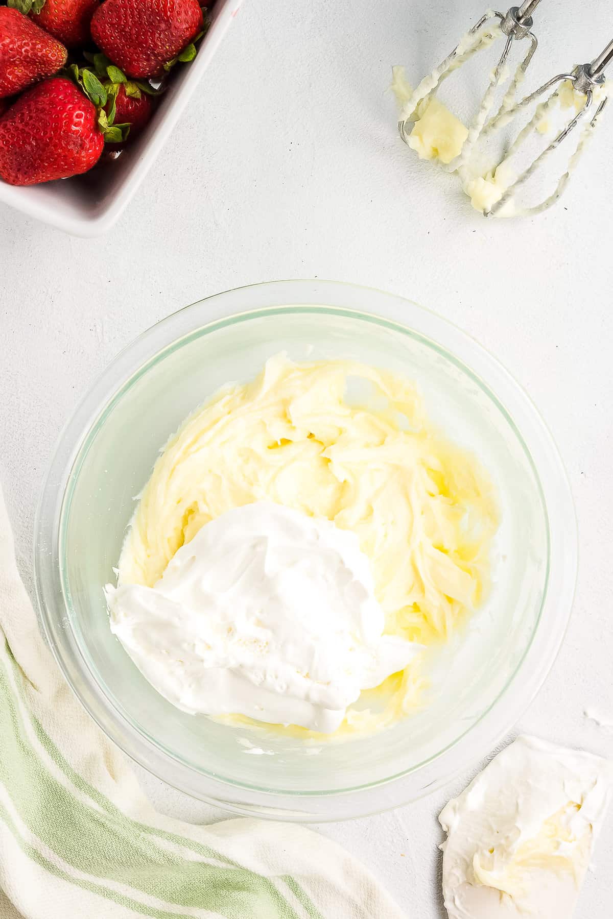 Glass bowl with cream cheese and sugar